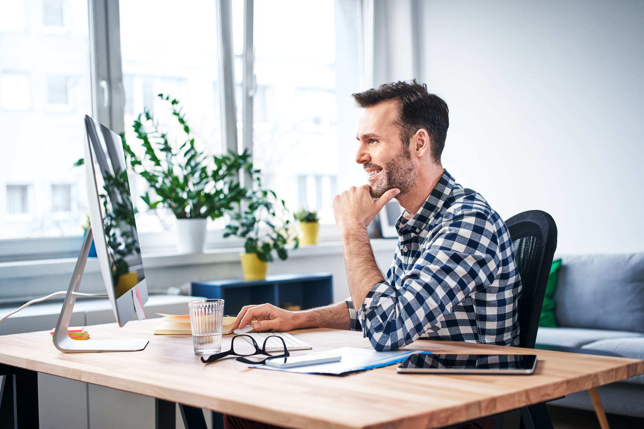 Photo of a man working on computer.