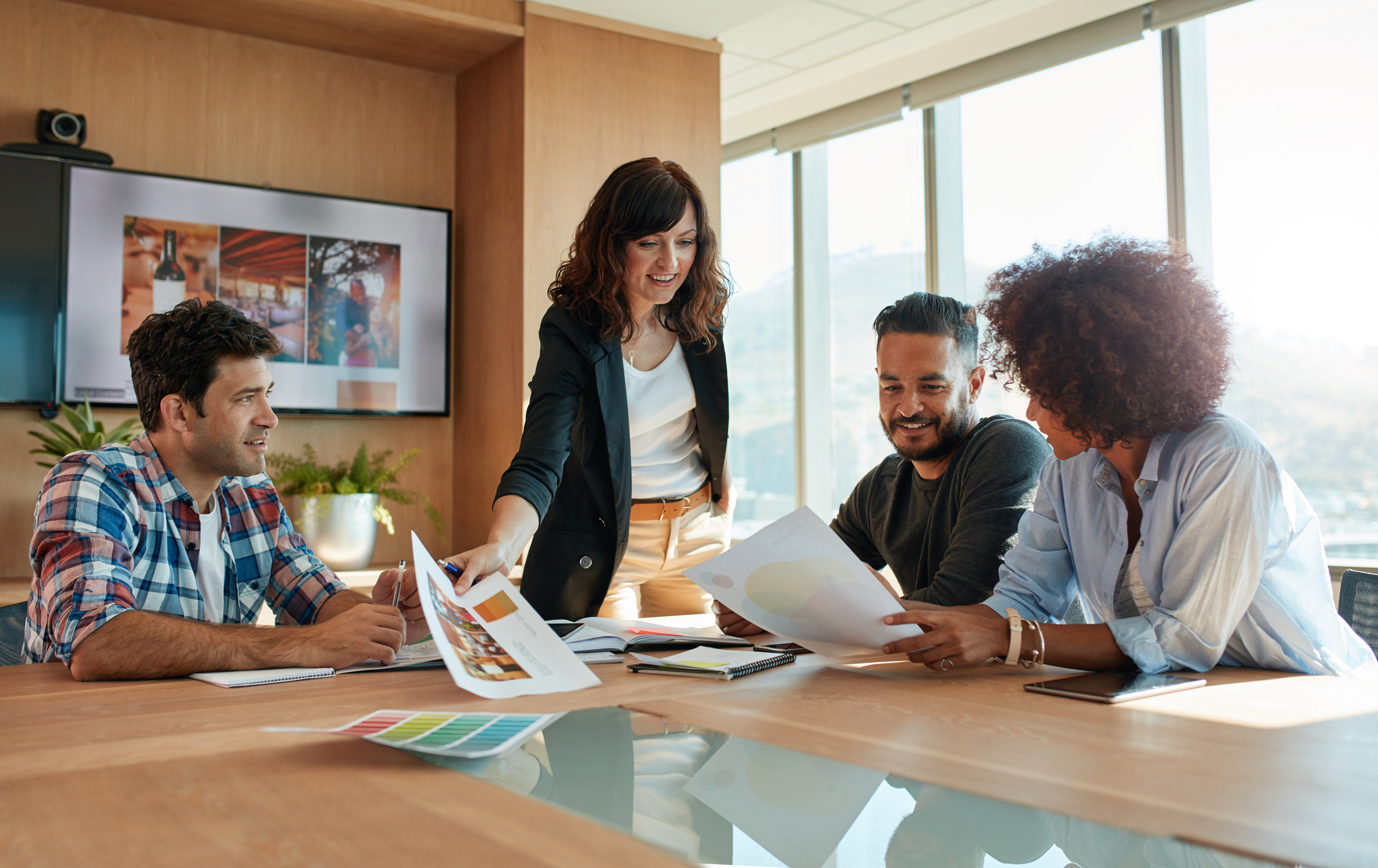GettyImages-694855106 Photo of a group of young business people meeting in conference room.