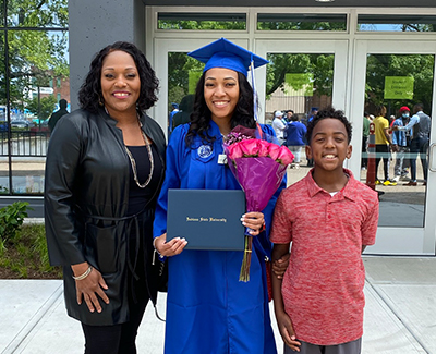 Graduation Photo of Ashley celebrating her graduation from Indiana State University in June 2021.