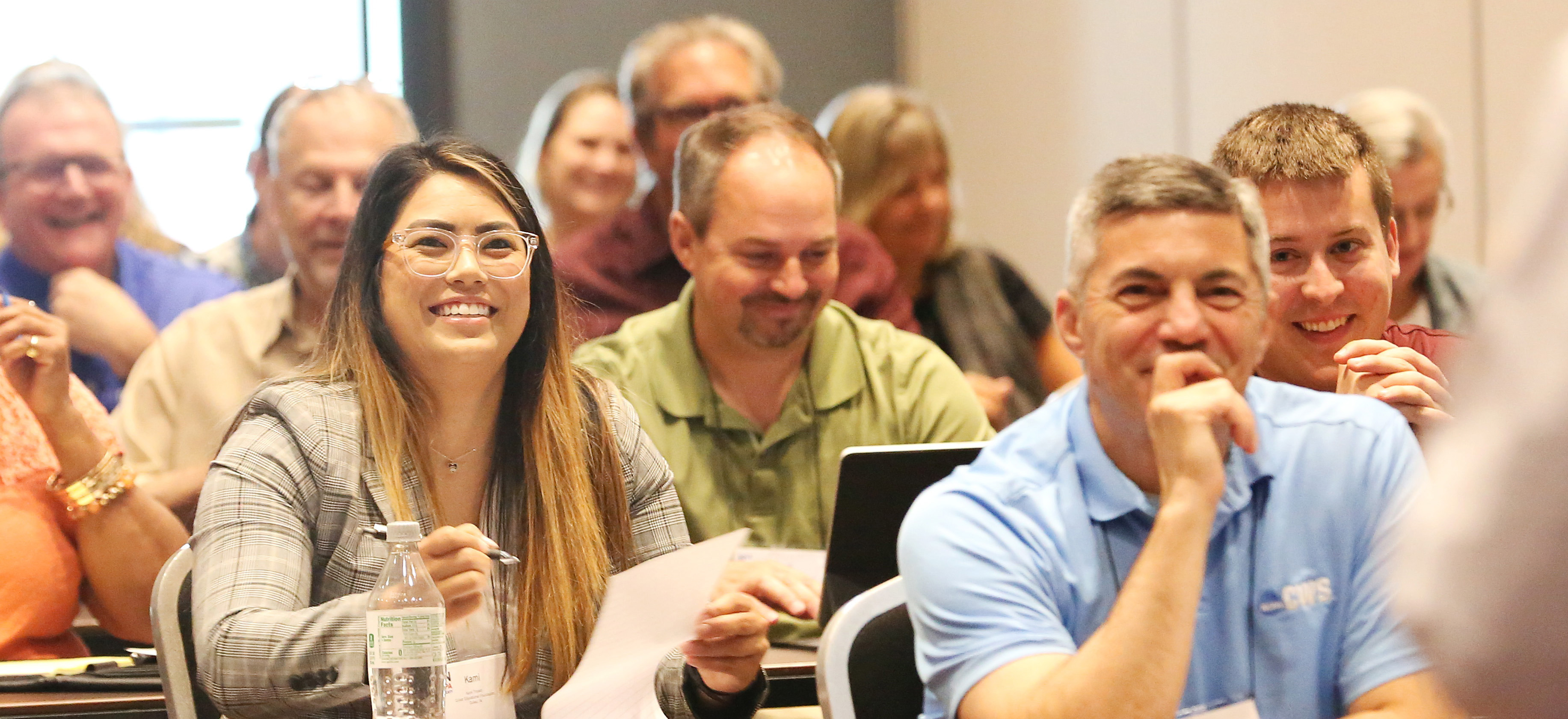 Photo of INCPAS members at a conference.
