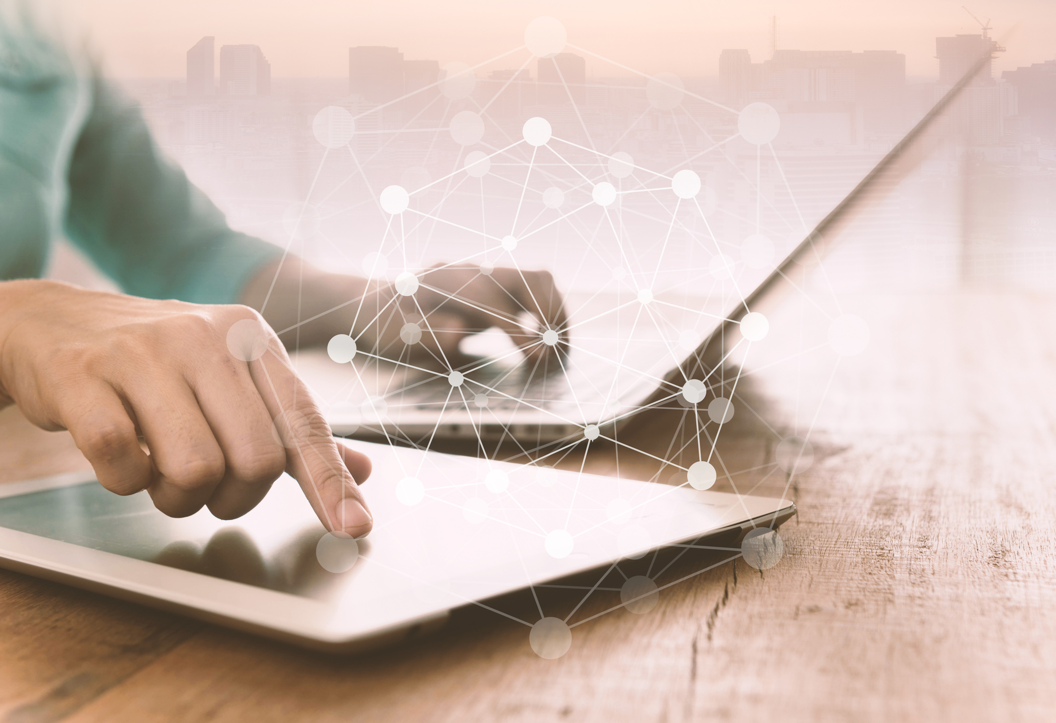 Photo of tablet and computer and interconnected network concept