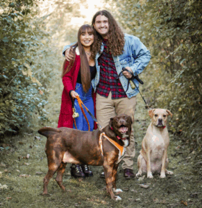 Malayna and her boyfriend, Zach, with their dogs Taz and Kobe