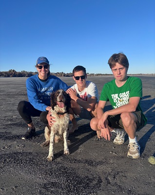 Spending time with her two sons and dog.